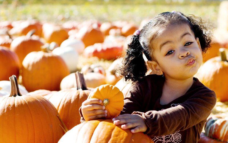Young Girl with Pumpkin