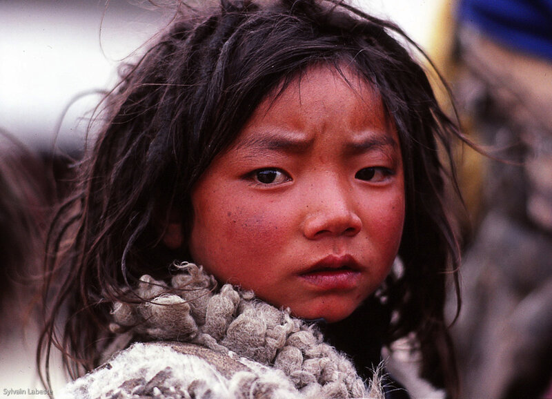 young girl with rosy cheeks