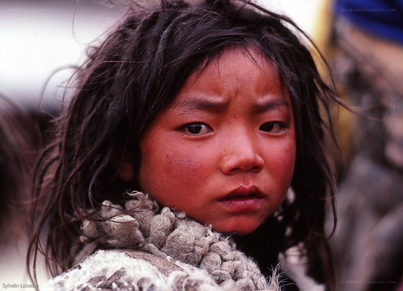 young girl with rosy cheeks