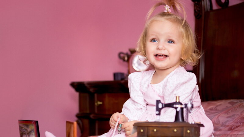 Young Girl with Sewing Machine