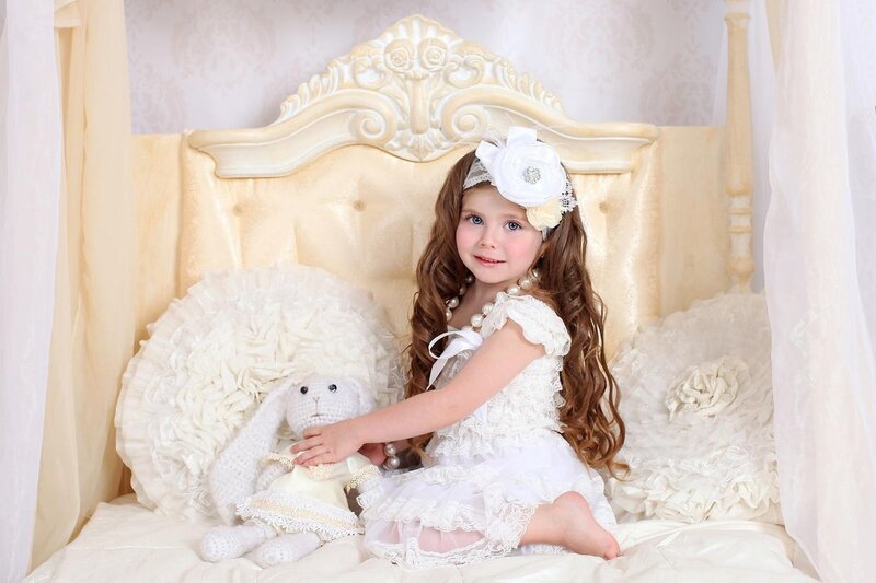 Young Girl with Stuffed Rabbit