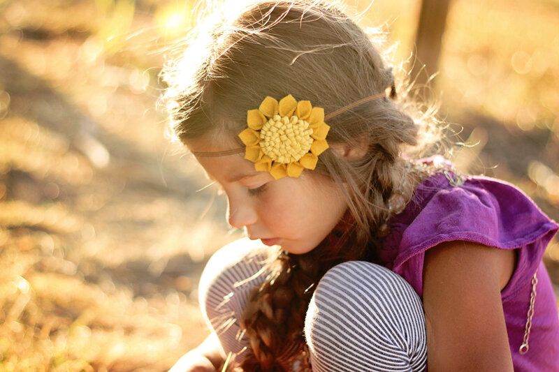 Young Girl with Sunflower Headband