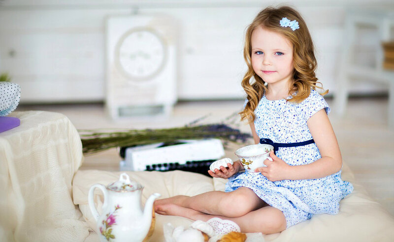 Young Girl with Tea Set