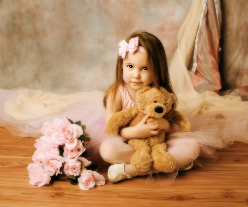 Young Girl with Teddy Bear