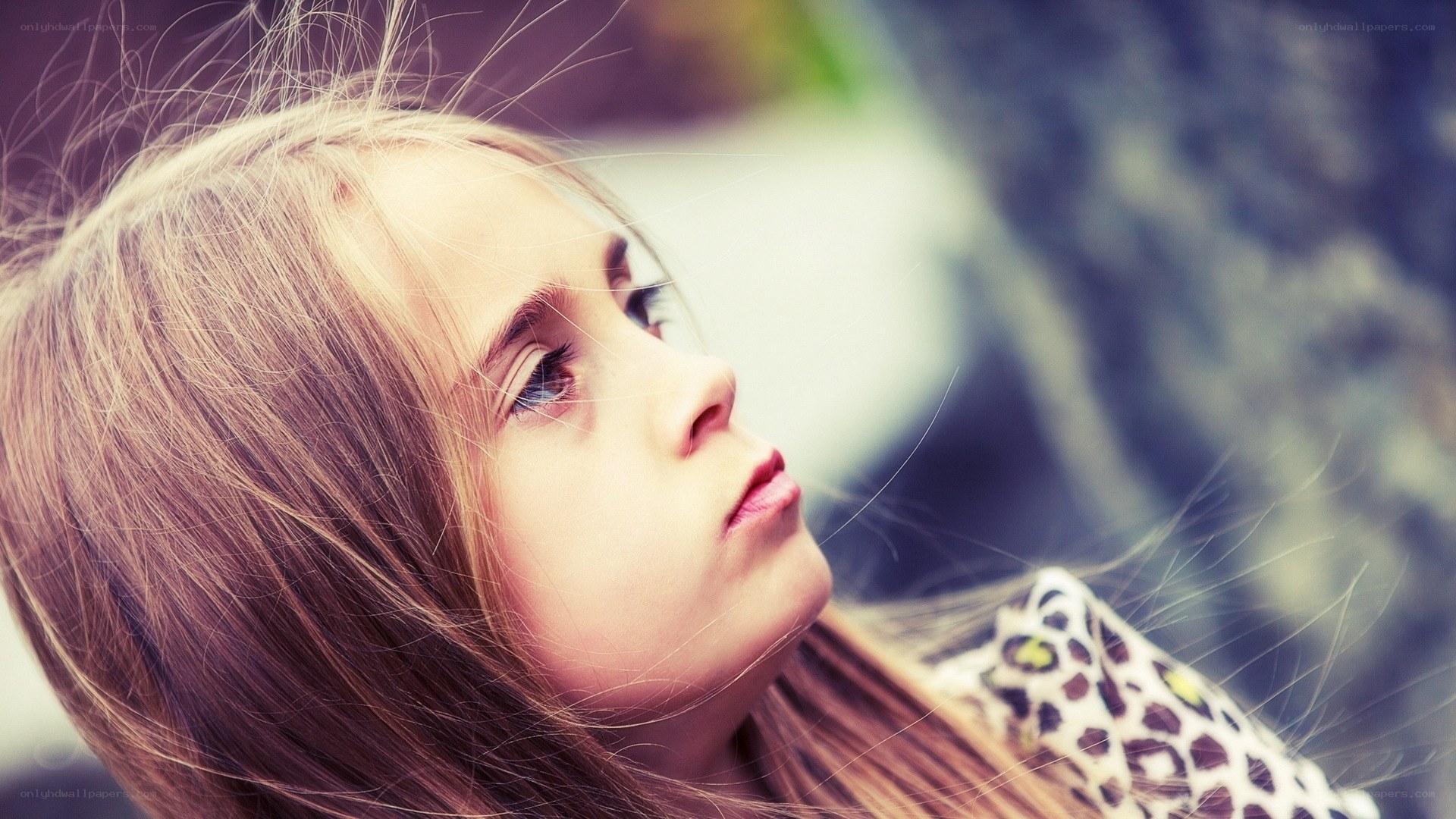 young girl with thoughtful expression
