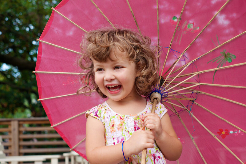Young Girl with Umbrella — Pink