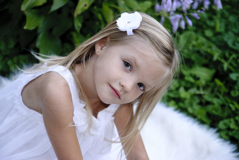 Young Girl with White Flower