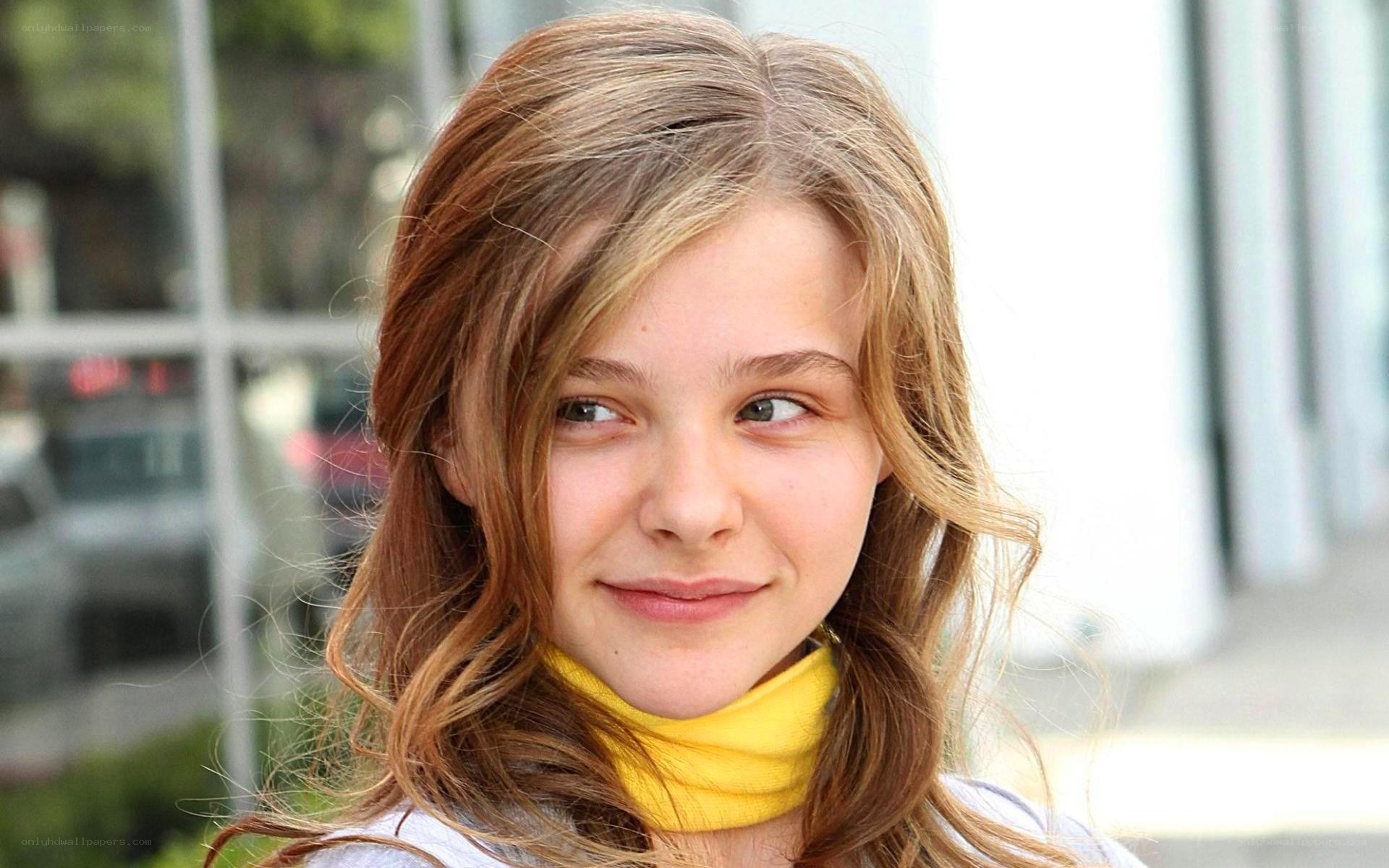 young girl with yellow scarf