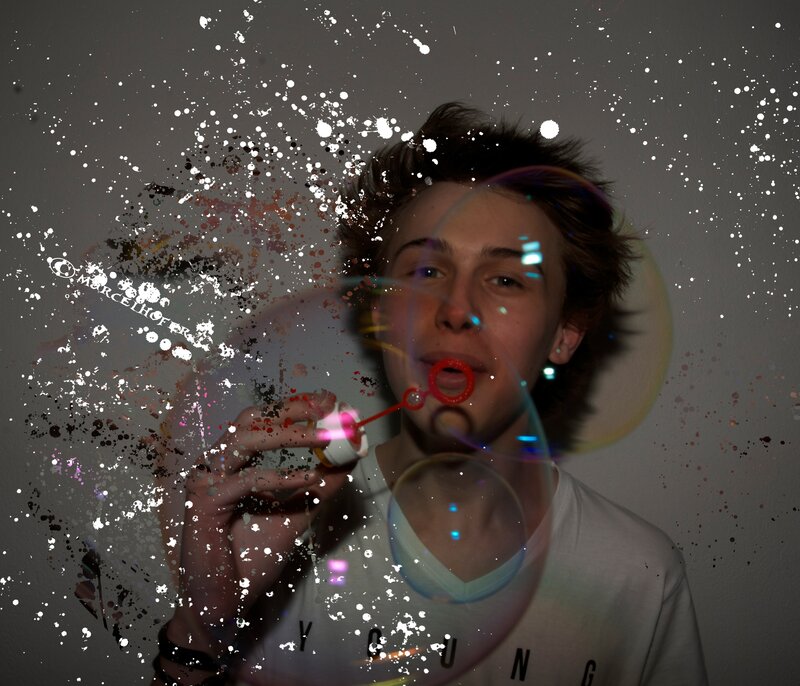 Young Man Blowing Bubbles