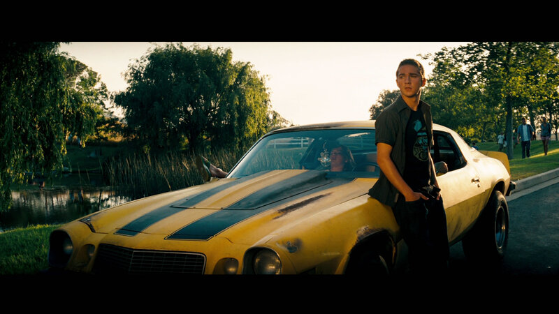 Young Man by Yellow Car