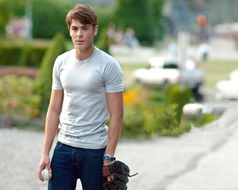 Young Man Holding Baseball