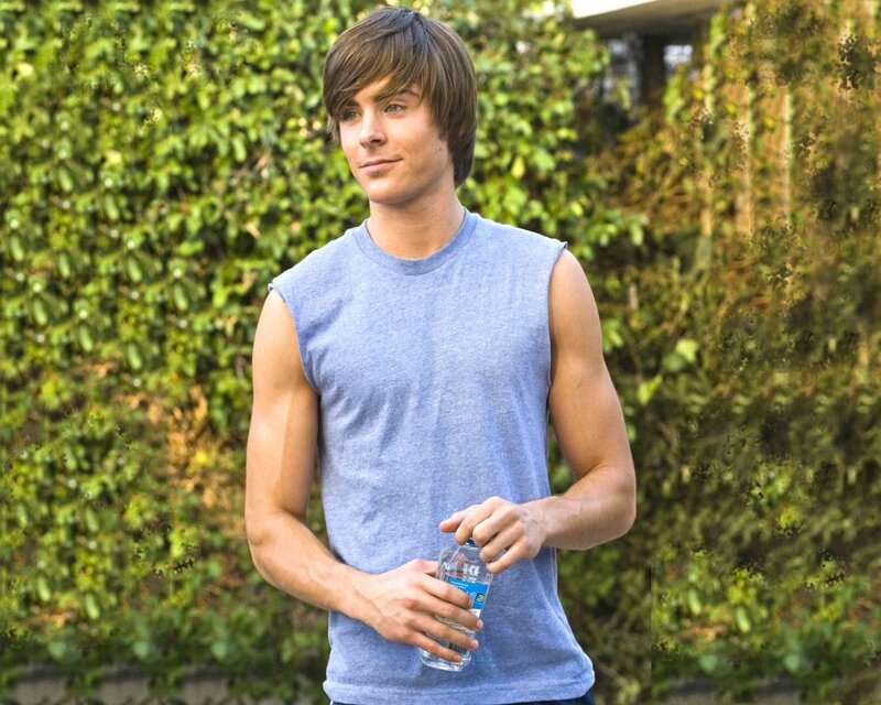 Young Man Holding Water Bottle