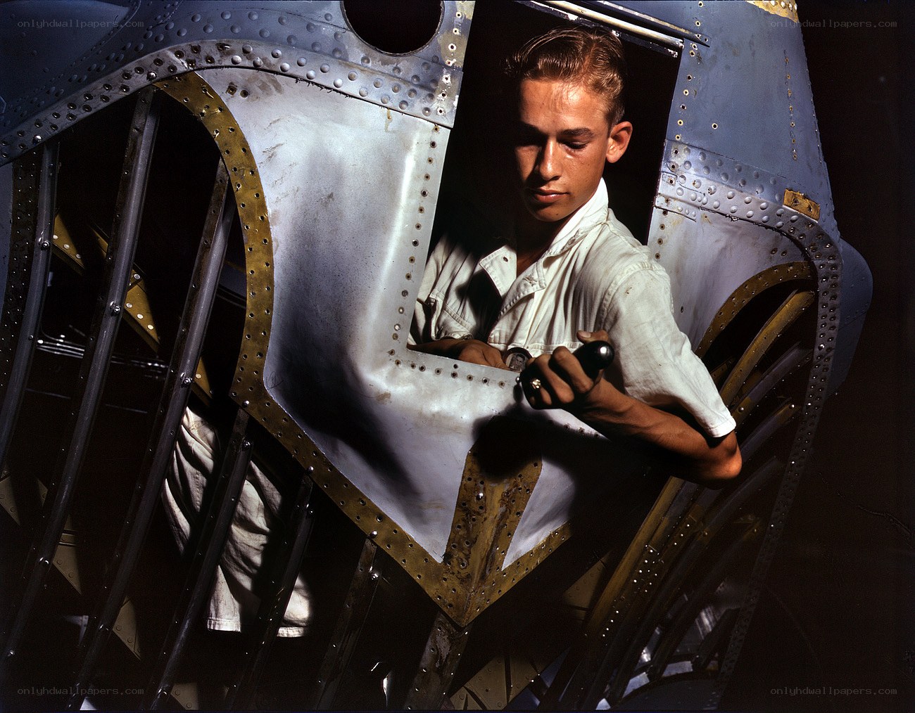 Young man in aircraft cockpit