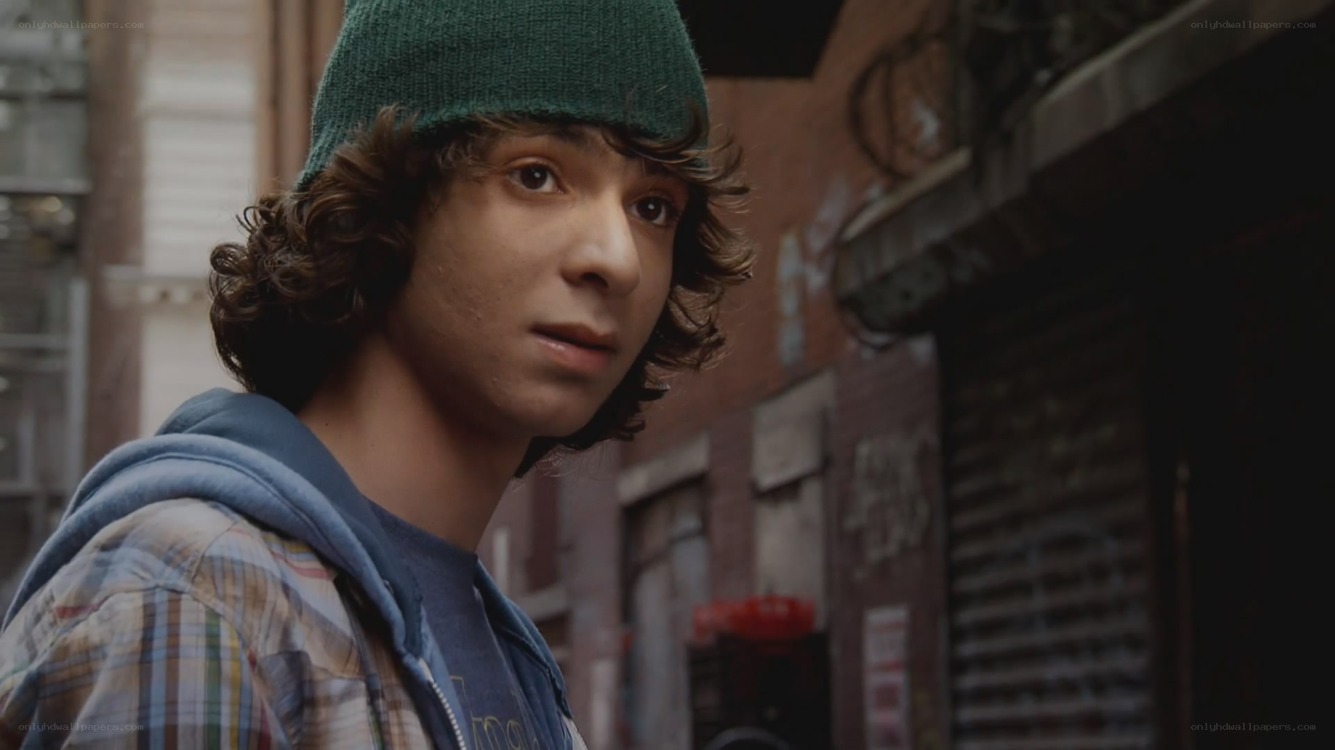 young man in alleyway