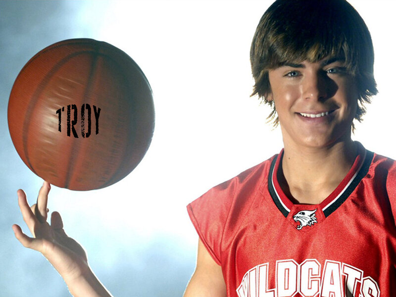 Young Man in Basketball Uniform