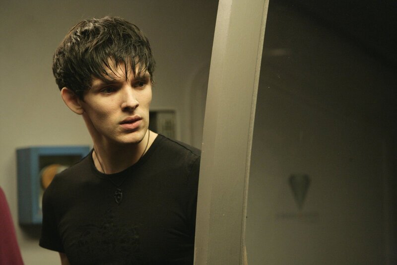 Young Man in Black Shirt — Serious