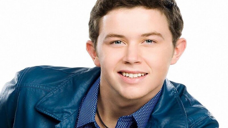 young man in blue jacket