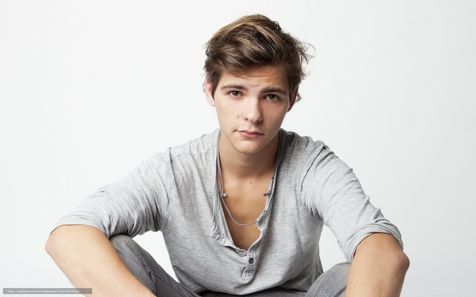 young man in gray shirt