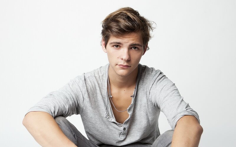 young man in gray shirt
