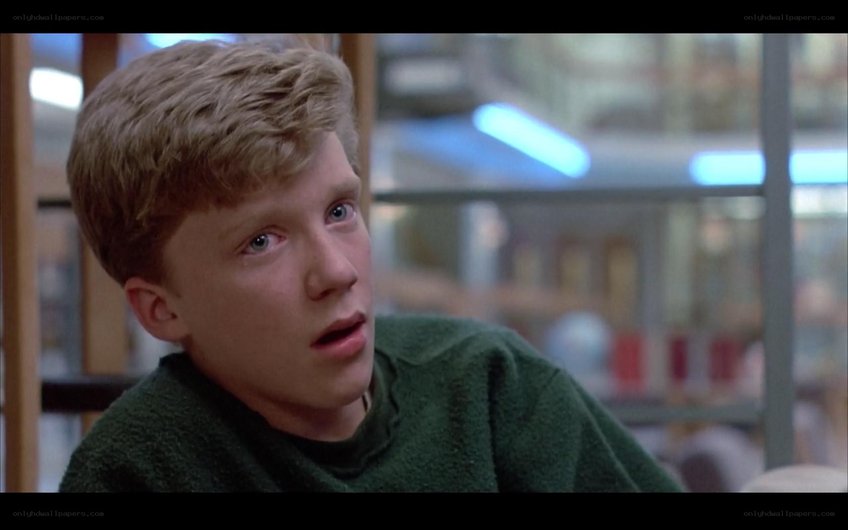 young man in green sweater