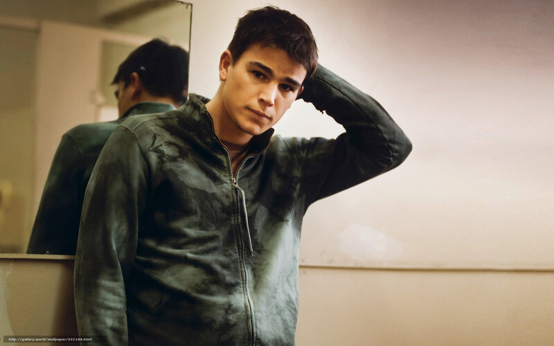 Young Man in Jacket — Green, Serious