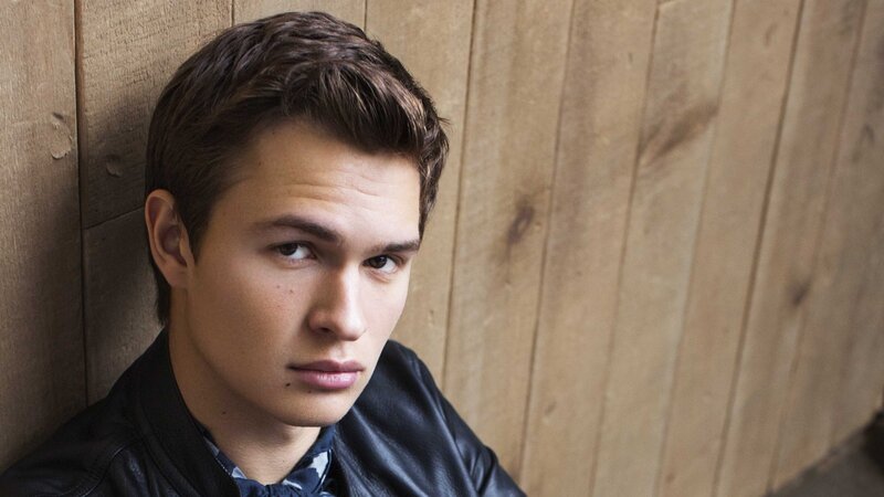 Young Man in Leather Jacket — Brown, Serious