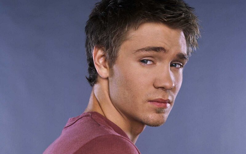 Young Man in Maroon Shirt — Blue