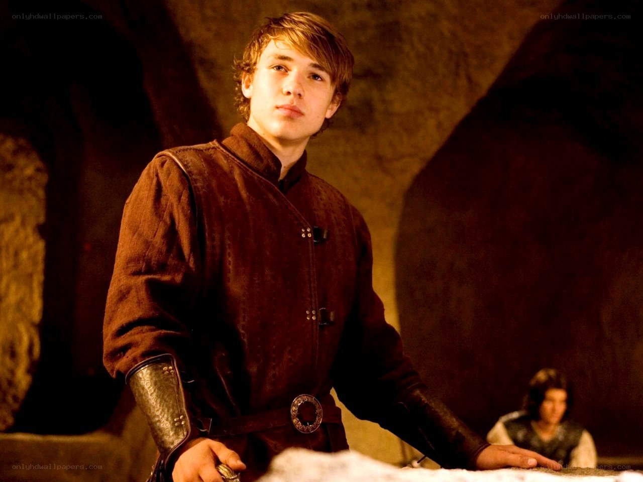 young man in medieval attire
