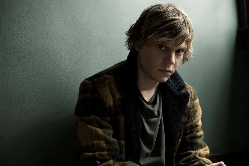 Young Man in Plaid Coat