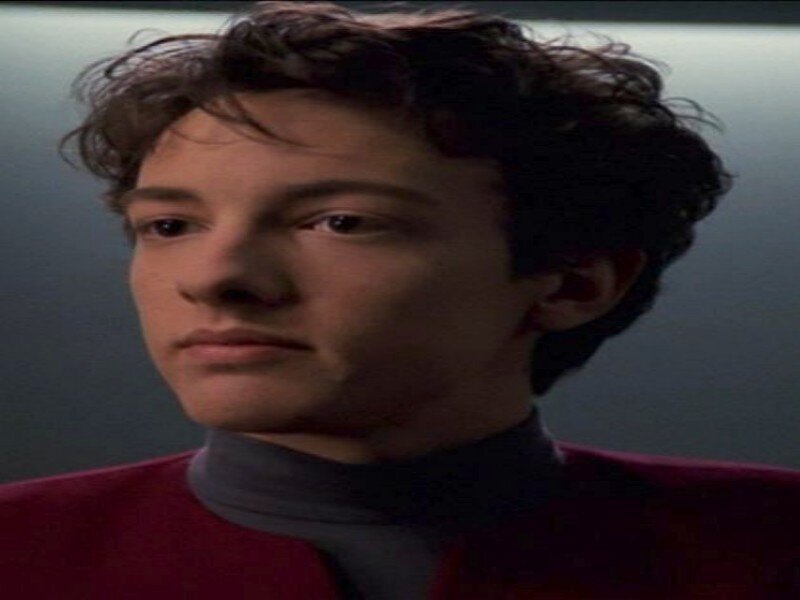 Young Man in Red Uniform