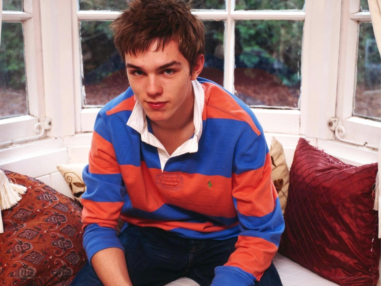 young man in striped sweater
