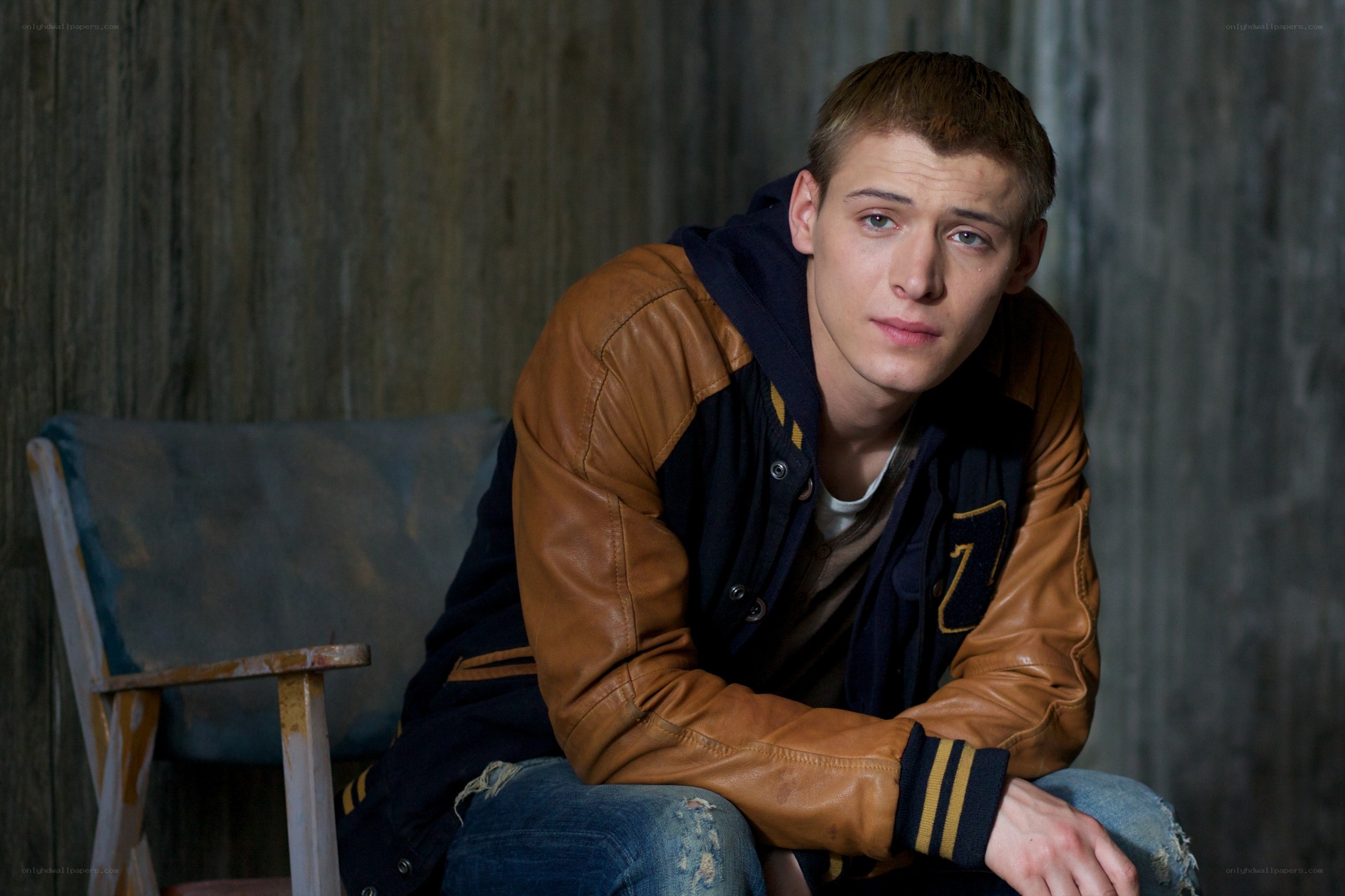 young man in varsity jacket