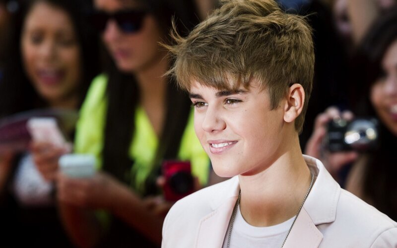 Young Man in White Jacket