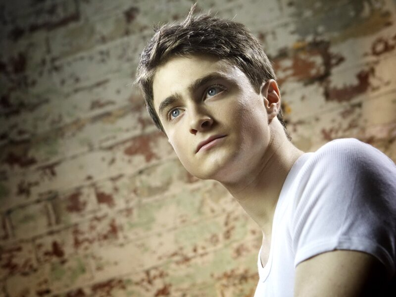 Young Man in White Shirt — Serious