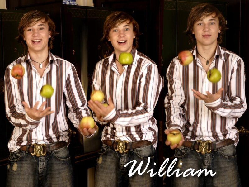 Young man juggling apples