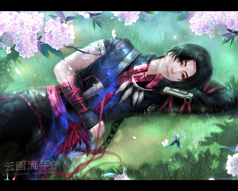 Young Man Lying in Grass