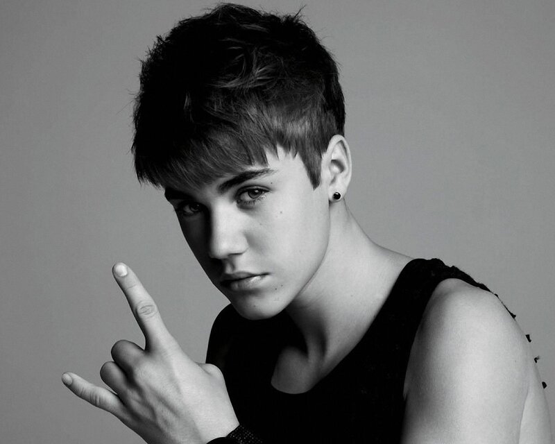 Young Man Making Hand Gesture — Black, Serious