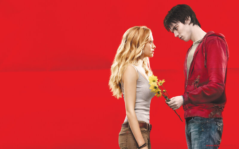 Young Man Offering Flowers