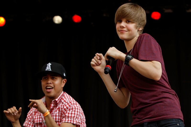 Young Man Singing on Stage