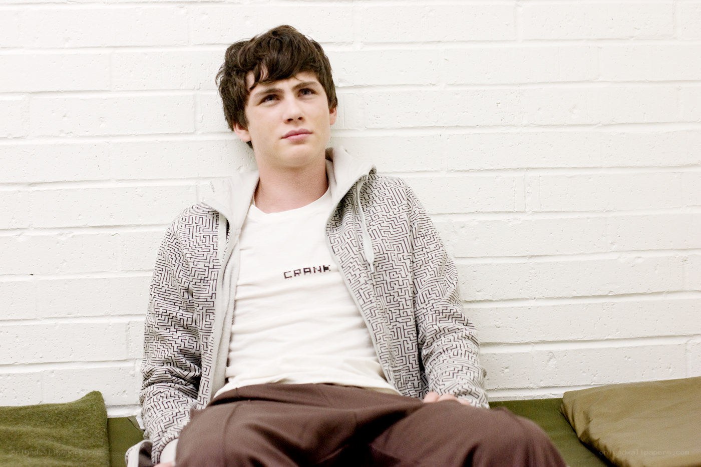 young man sitting on couch