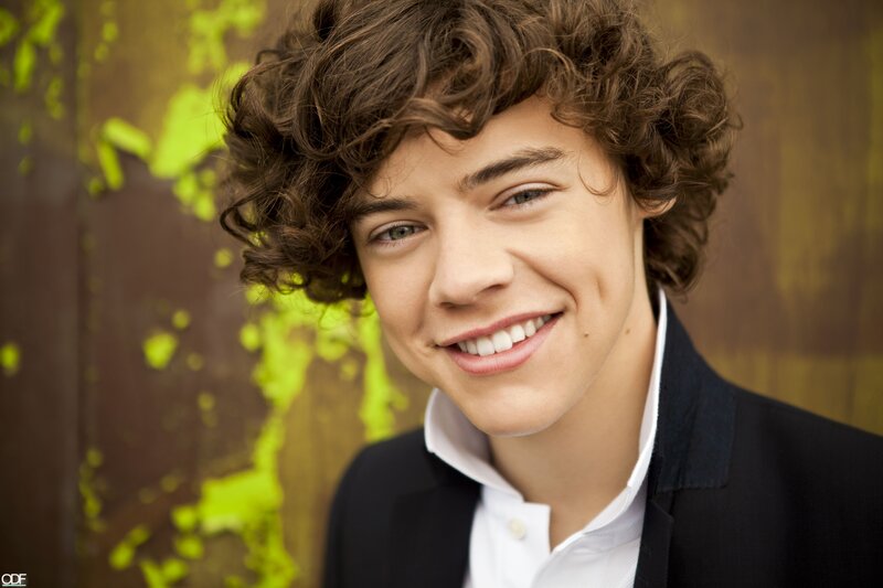 Young Man with Curly Hair — Brown, Friendly, Photograph