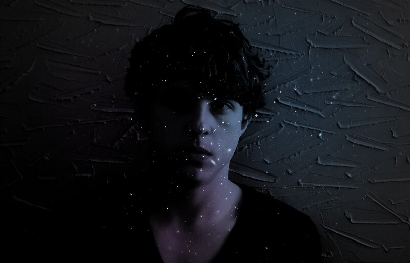 Young Man with Dark Hair — Black, Dramatic, Night