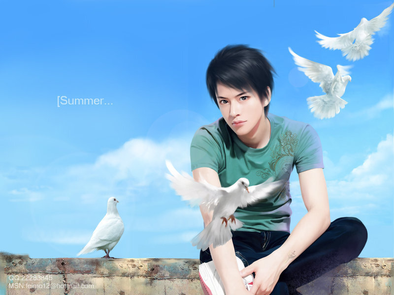 Young man with doves in summer