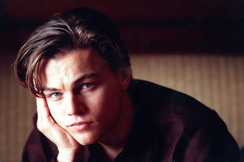 Young Man with Hand on Cheek