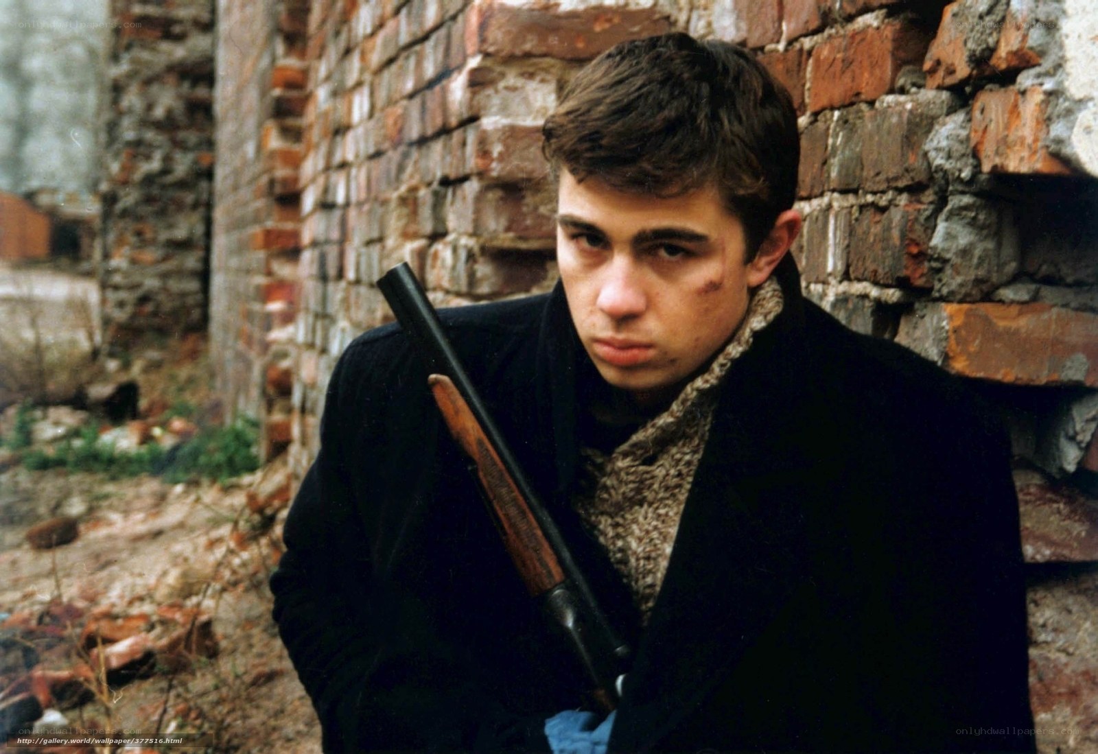 young man with shotgun
