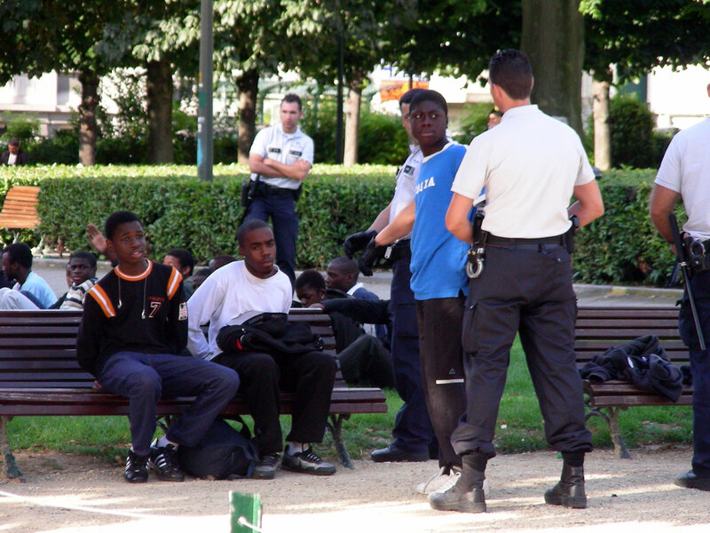 Young Men with Police Officers