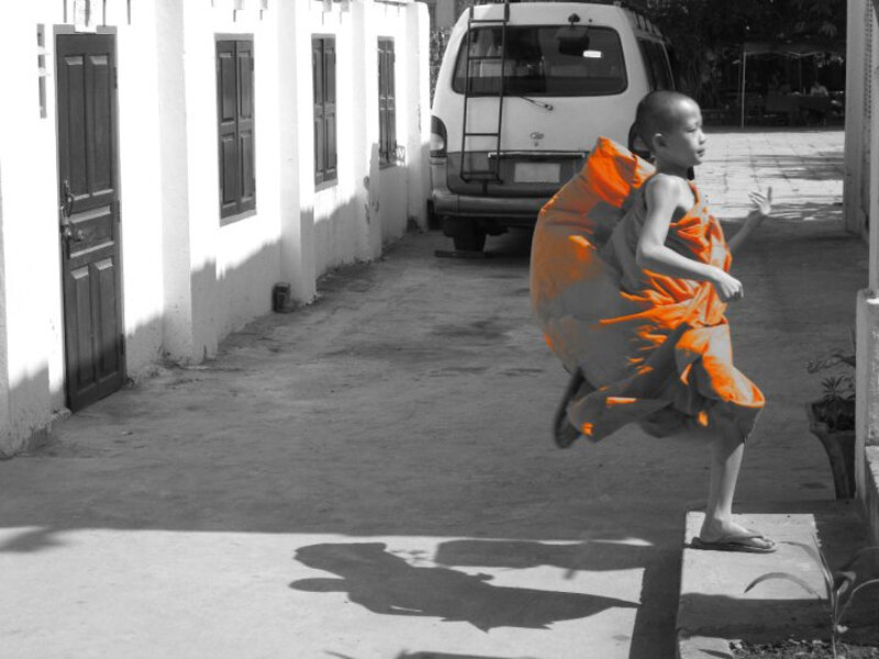 Young Monk Running