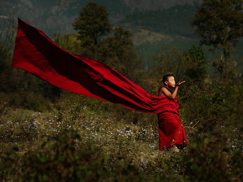Young monk with red robe