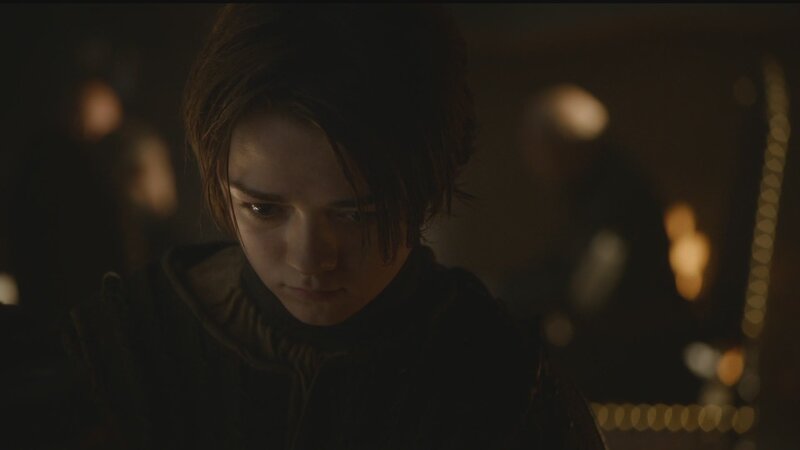 young person in dim light