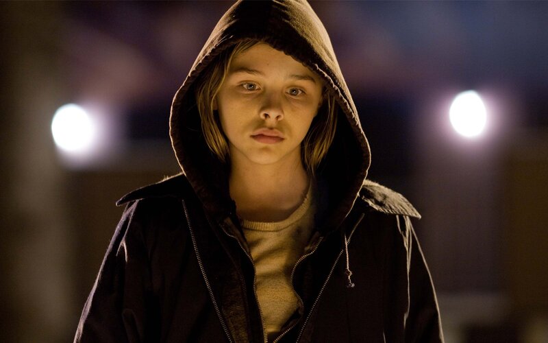 Young Person in Hooded Jacket